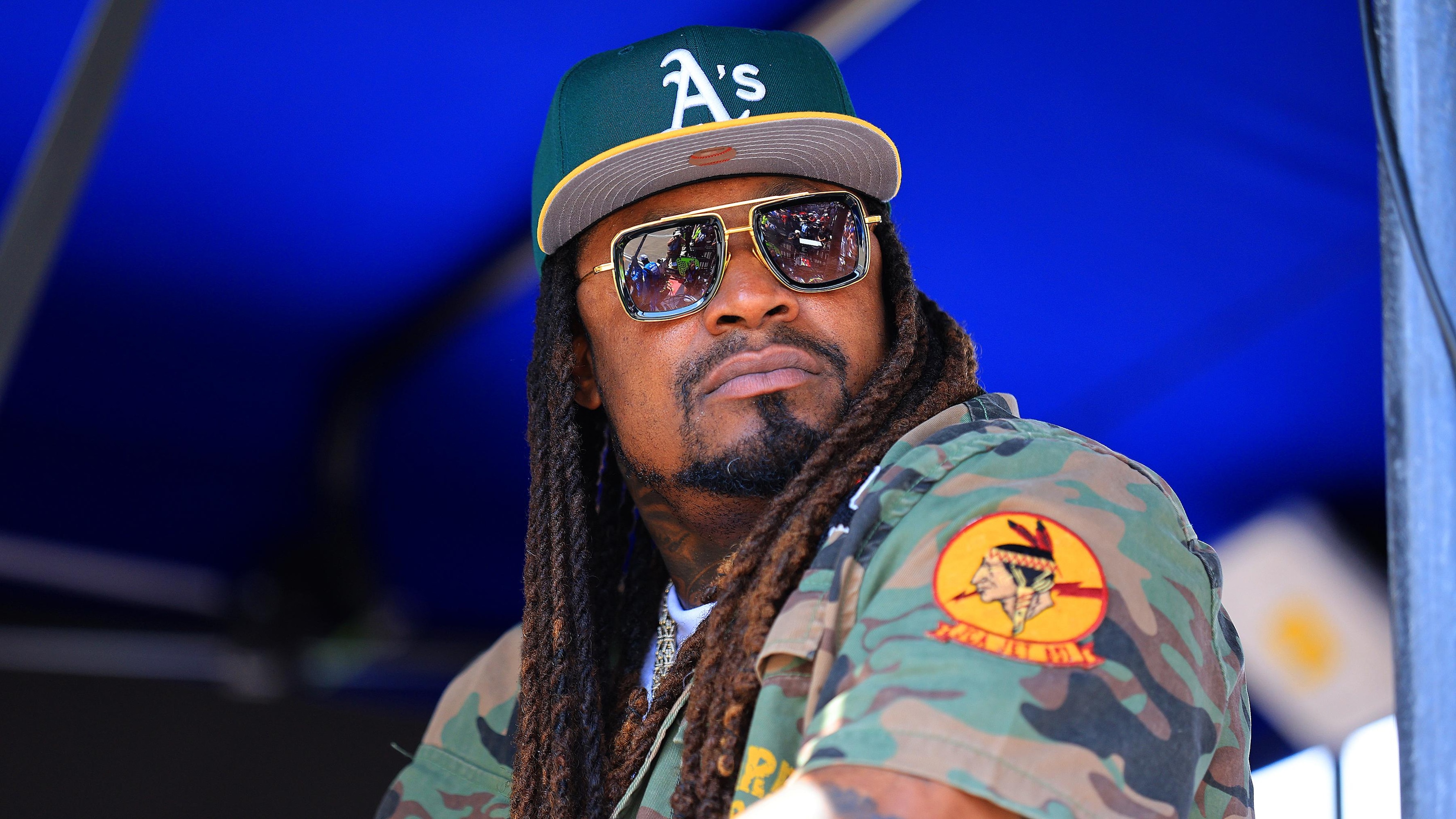Marshawn Lynch Serves as Photographer for Ronda Rousey vs. Gina Carano MMA Fight Card in New Videos